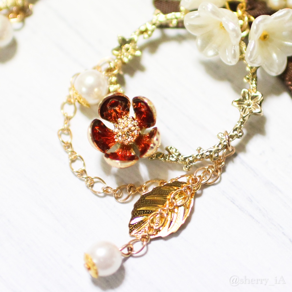 祝福と華やかな梅の耳飾り