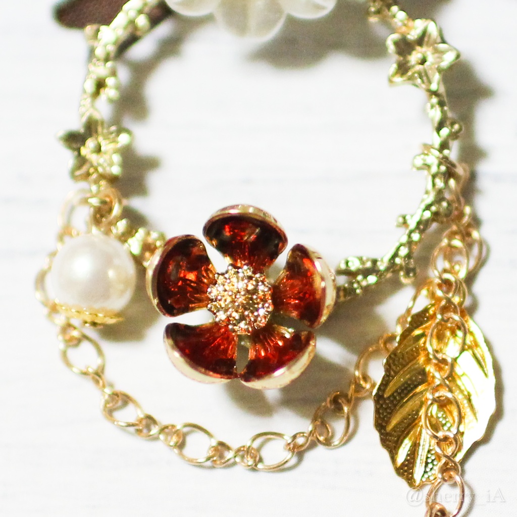 祝福と華やかな梅の耳飾り