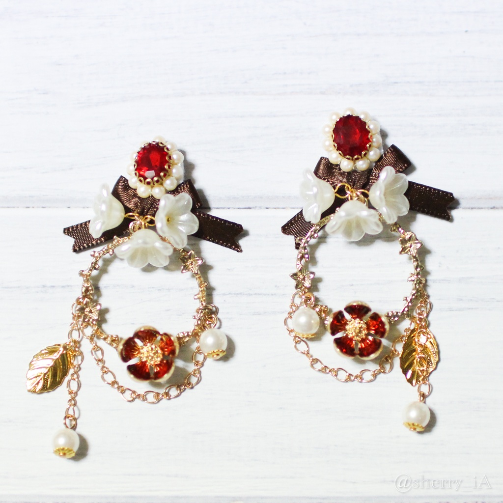 祝福と華やかな梅の耳飾り