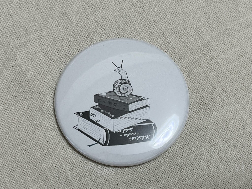 本とかたつむり　缶ミラー