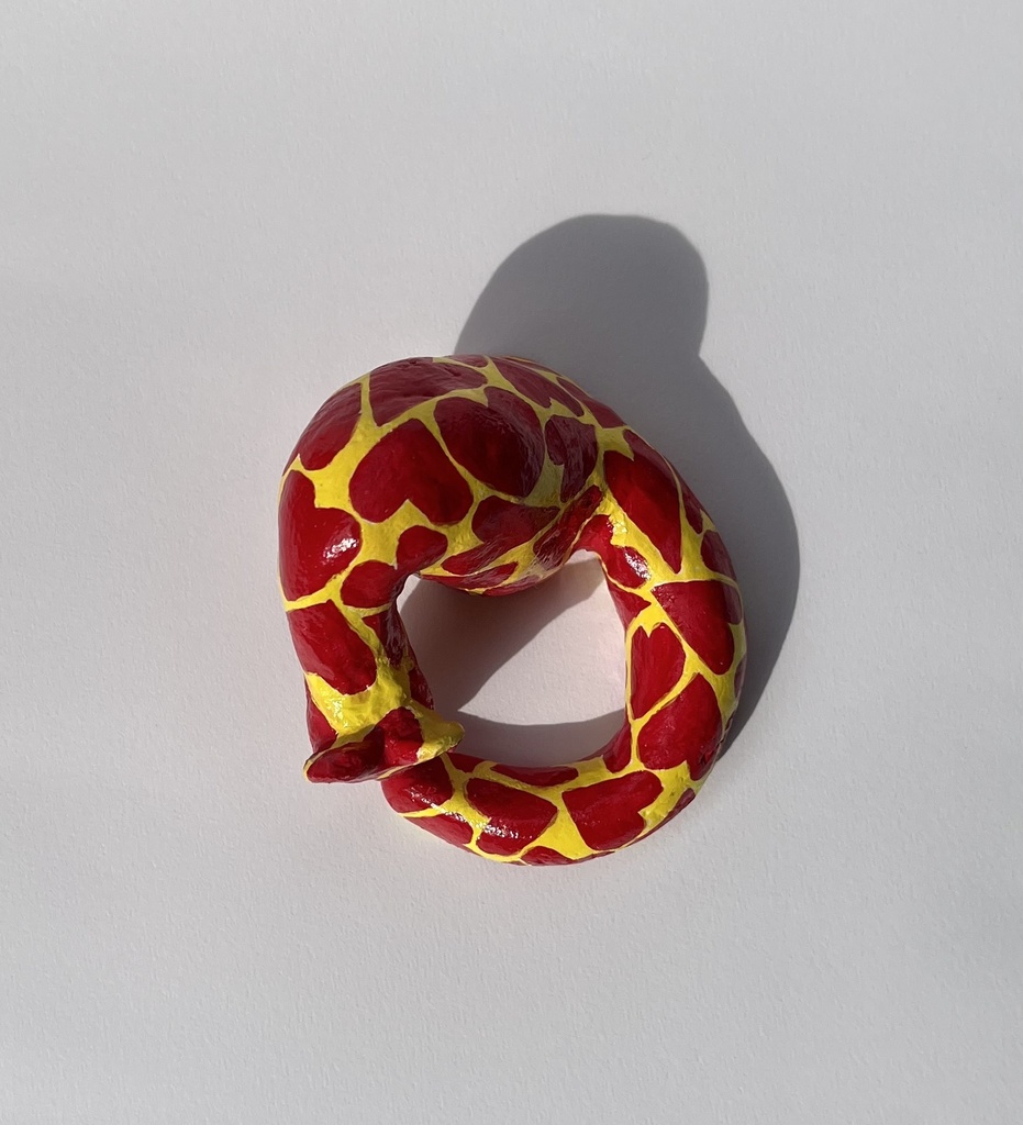 しっぽを嗅ぐ猫