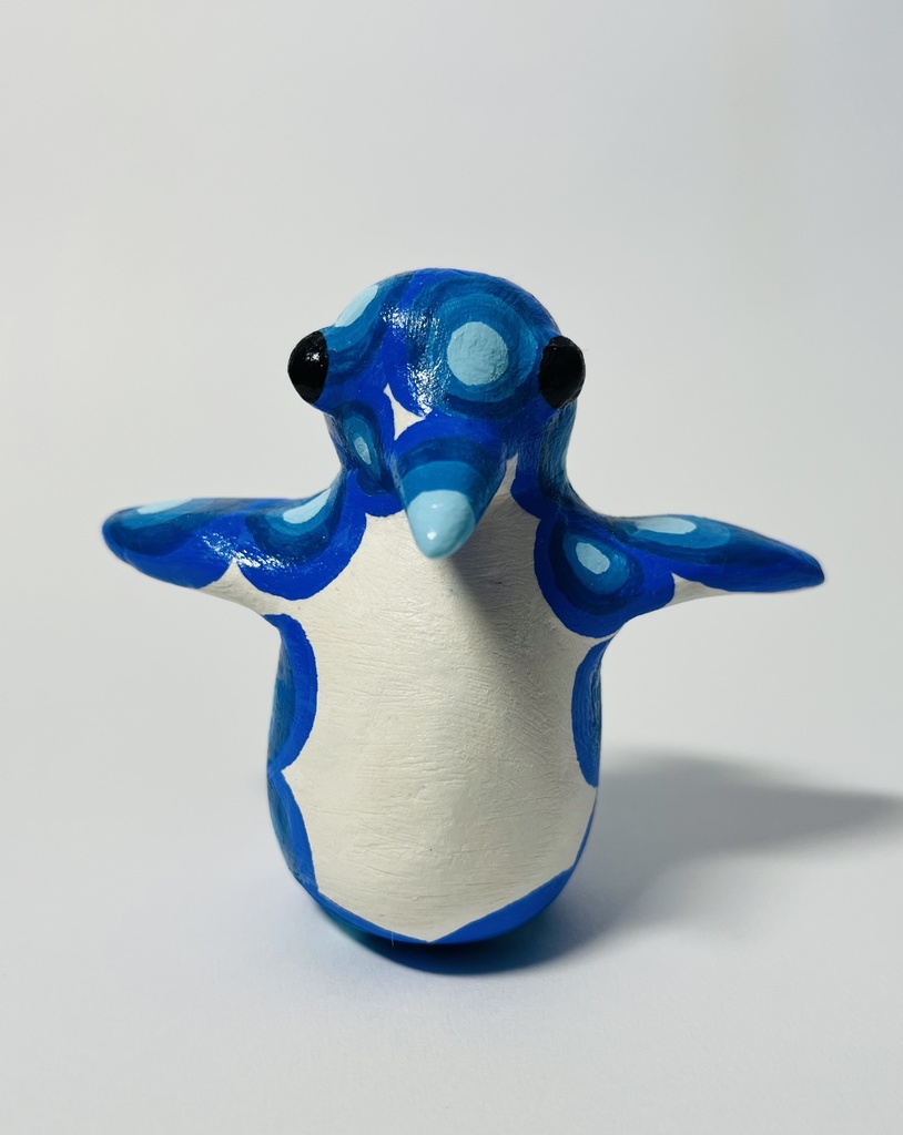 空を飛ぼうとしてるペンギン