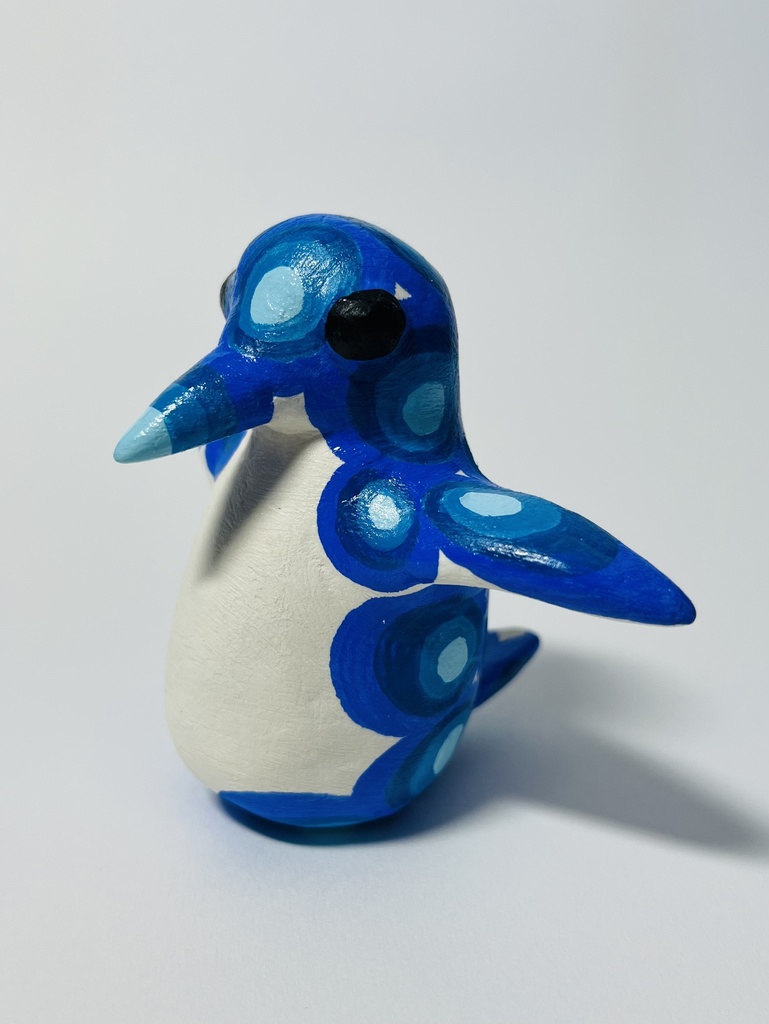 空を飛ぼうとしてるペンギン