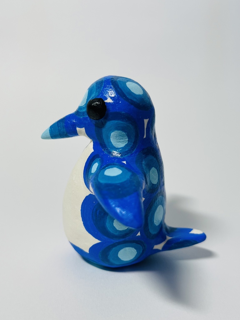 空を飛ぼうとしてるペンギン