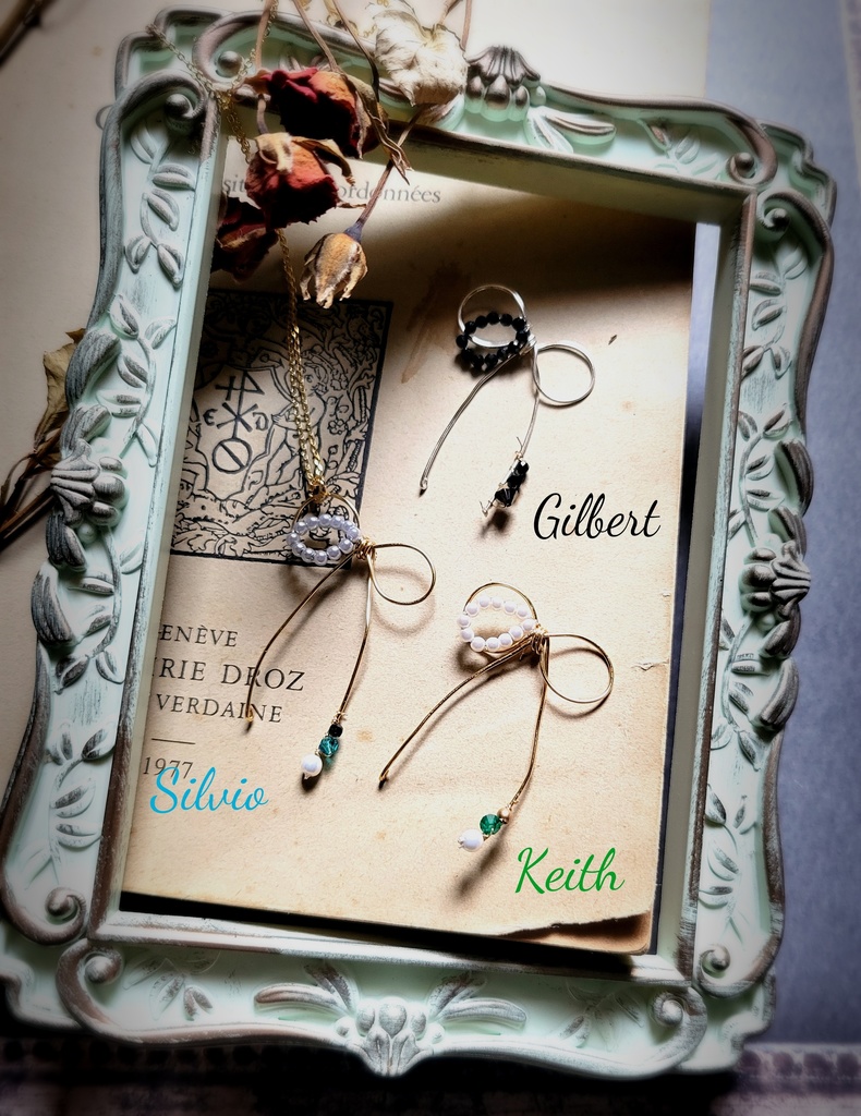 ゆれる、彼色を結んだリボンモチーフペンダント