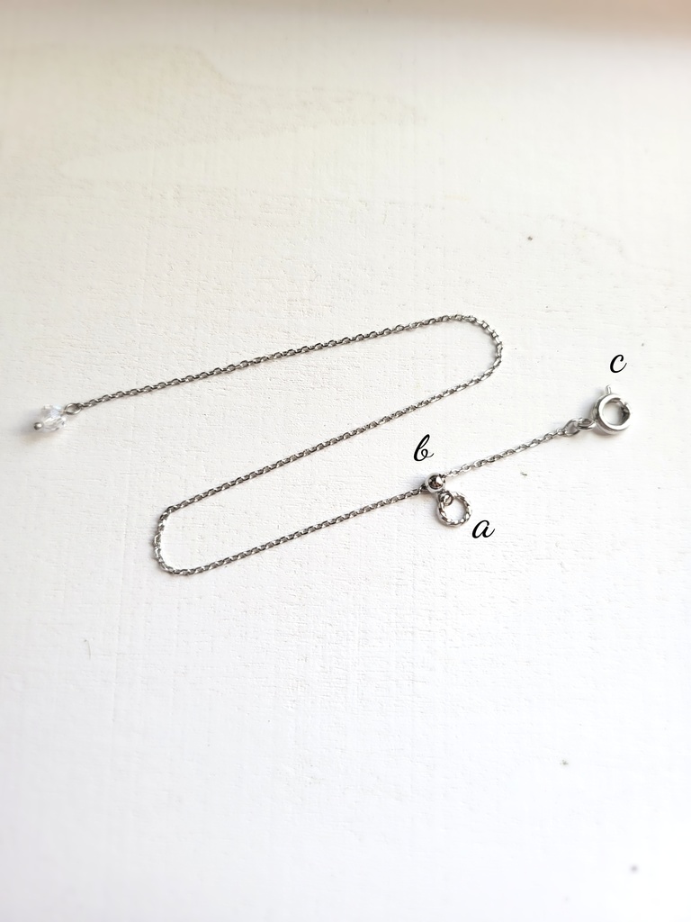 ゆれる、彼色を結んだリボンモチーフペンダント