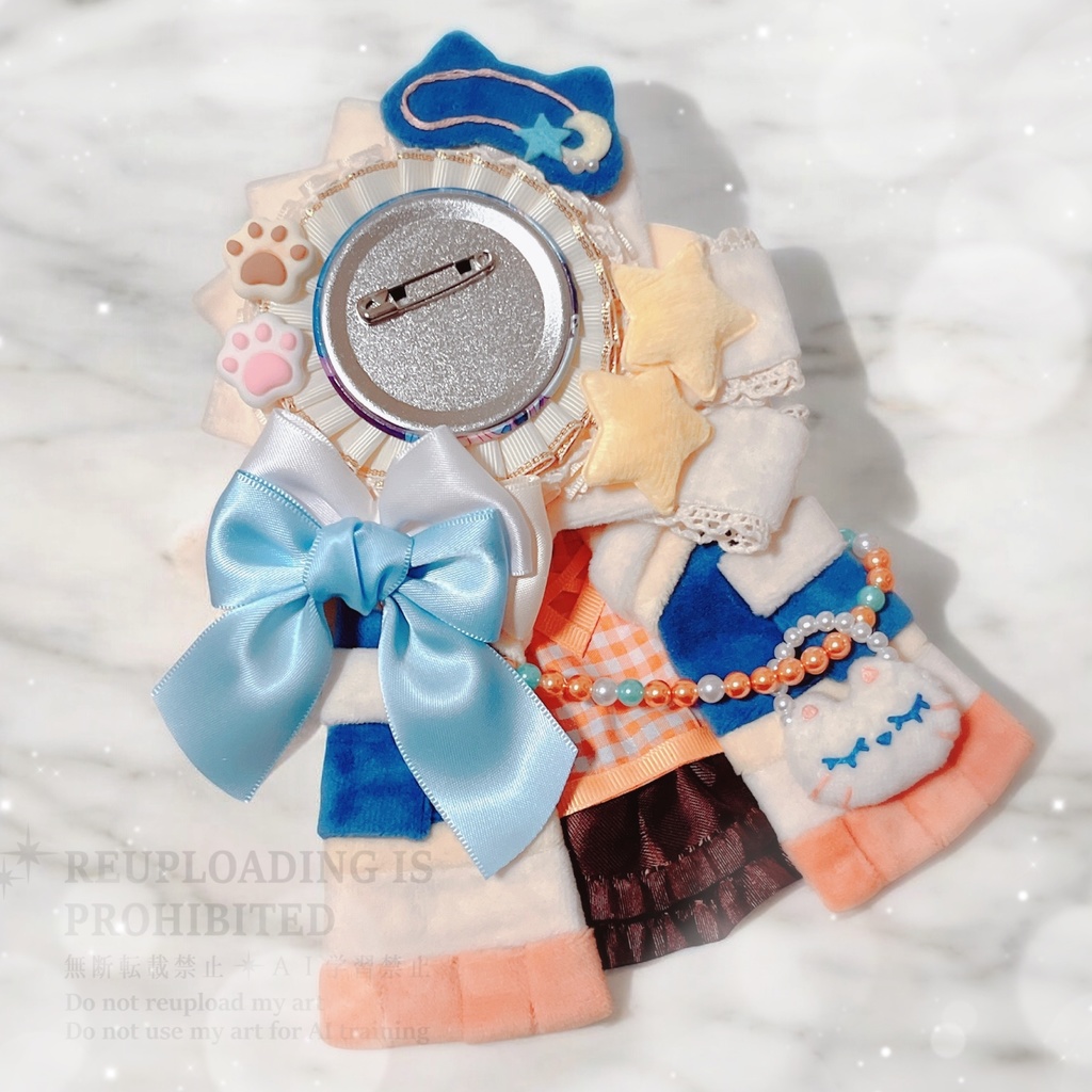衣装イメージロゼット (クリーム×オレンジ×水色)  