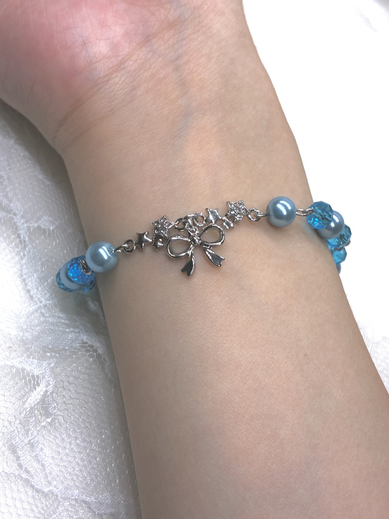 星とリボンチャーム付きのパールブレスレット