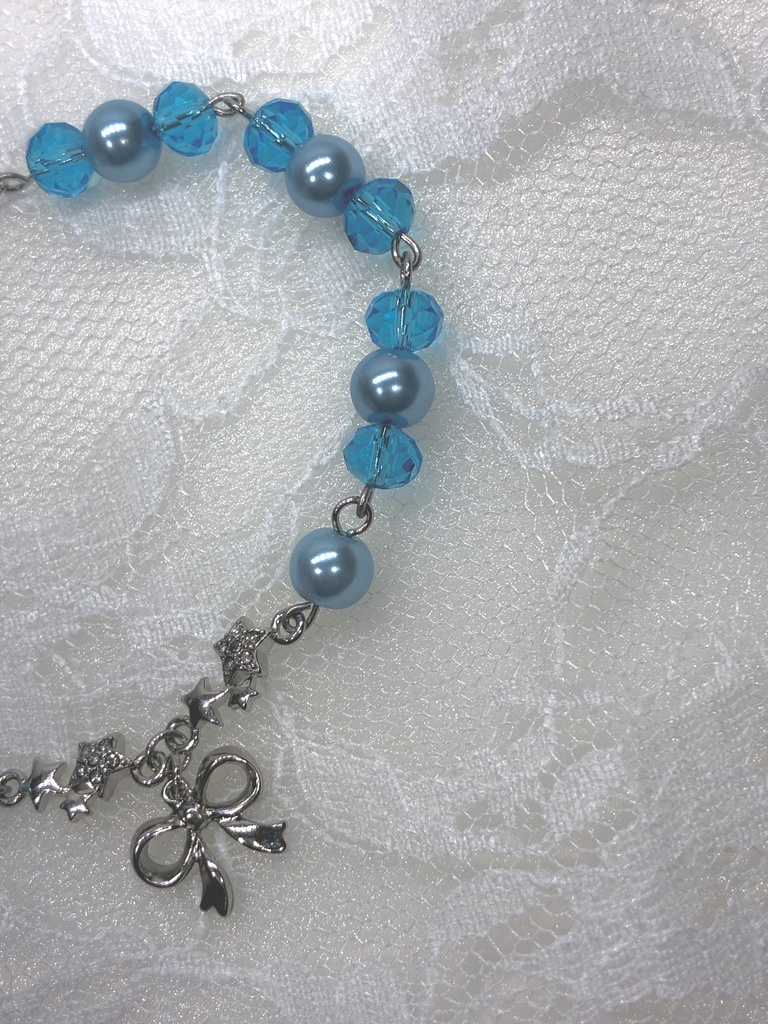 星とリボンチャーム付きのパールブレスレット