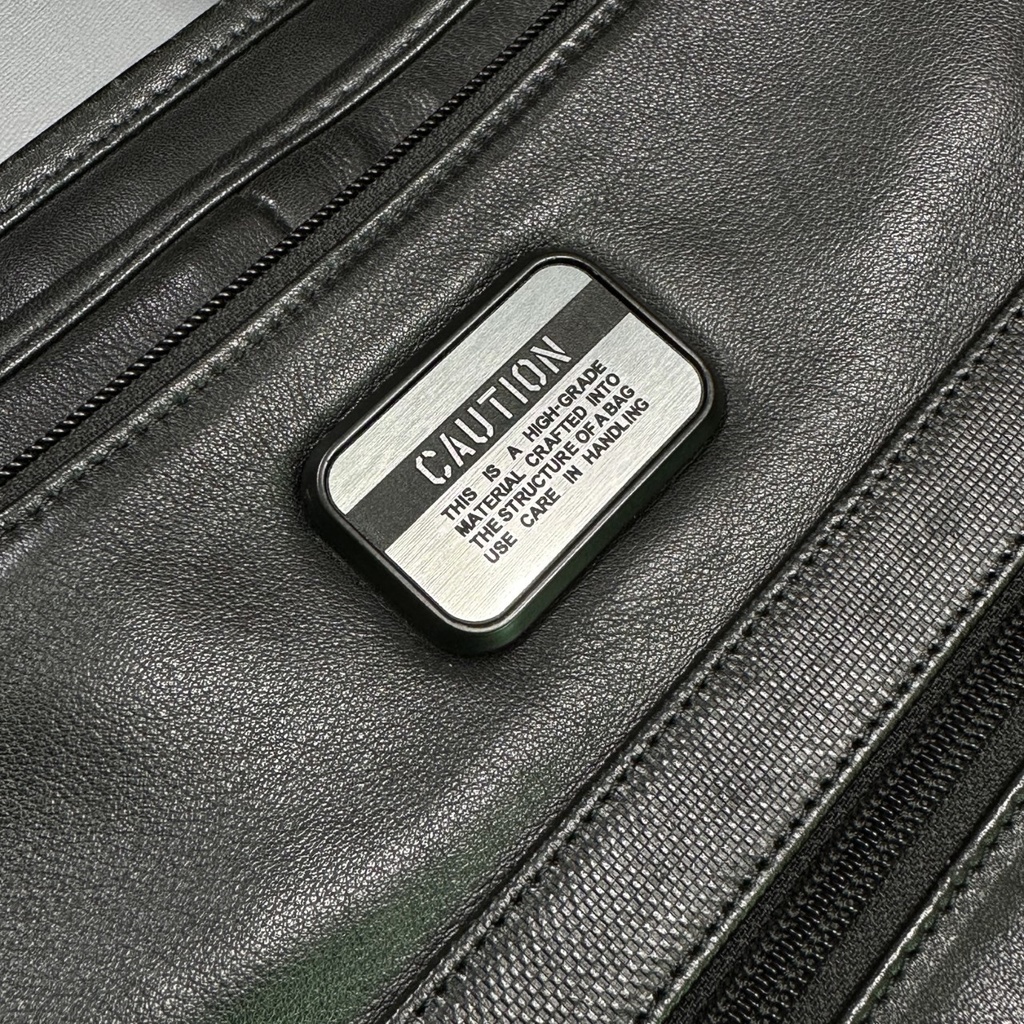 ◆TUMI カスタムプレート CAUTION 銀x黒 30x50mm