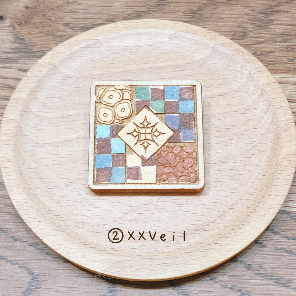 シャフユニモチーフウッドブローチ