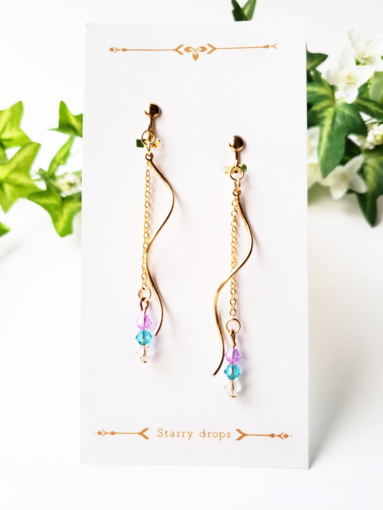 三連スワロのスパイラルイヤリング