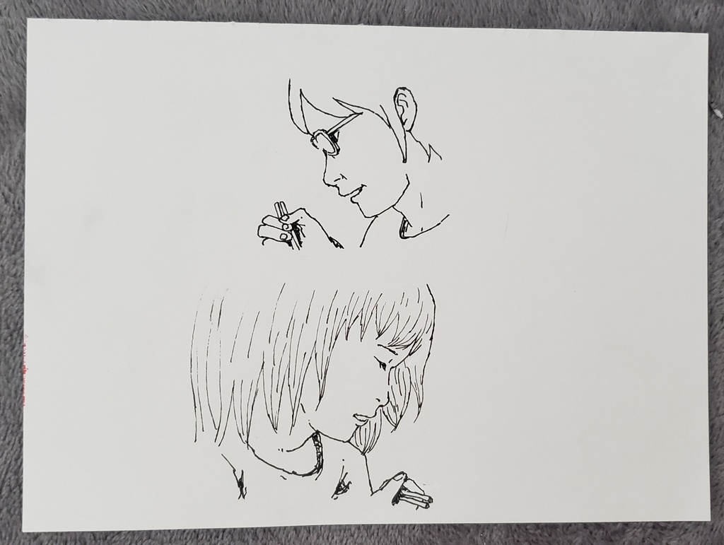 ご飯を食べる父親と娘