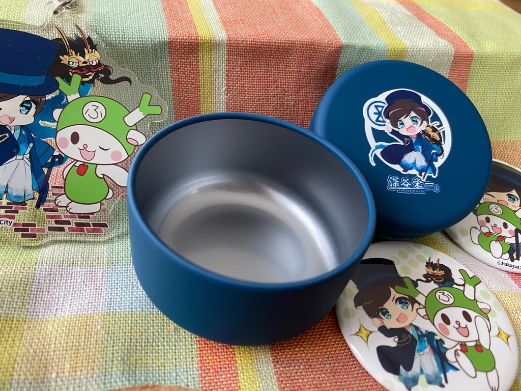 深谷栄一藍色缶ケース