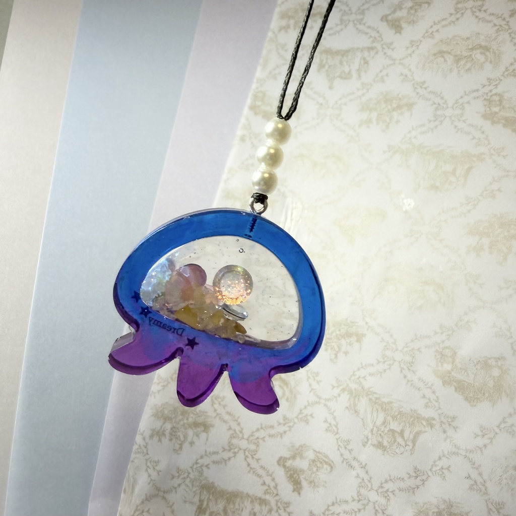 クラゲのシャカシャカストラップ青