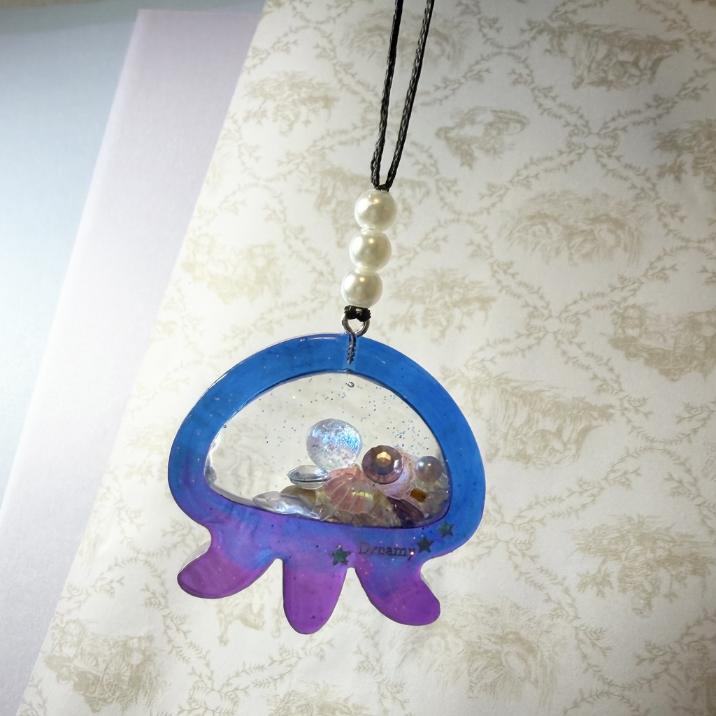 クラゲのシャカシャカストラップ青