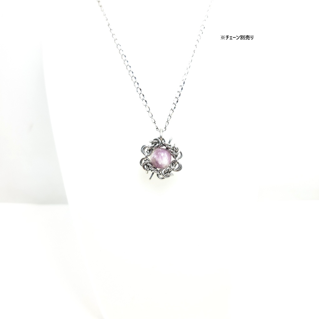 内包物が個性的! フェザー イン フローライト ペンダントトップ