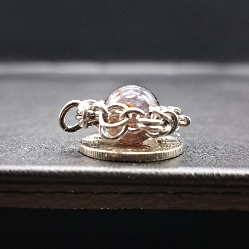 アイオライトに煌めく輝き! アイオライトサンストーン ペンダントトップ