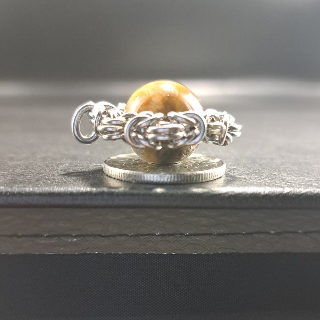 珍しい産地の イーグルアイ ペンダントトップ