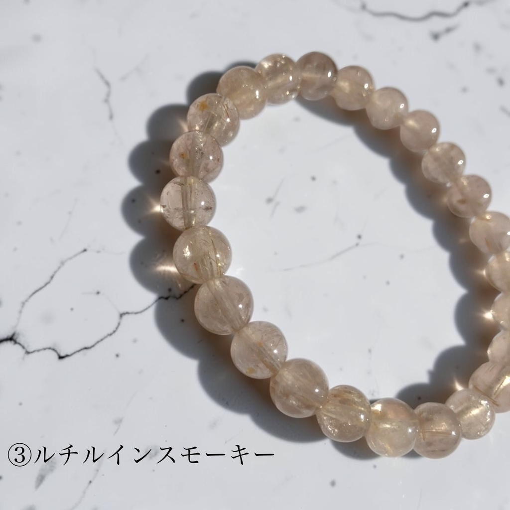 Rutilated Quartz /milky or smoky gray
