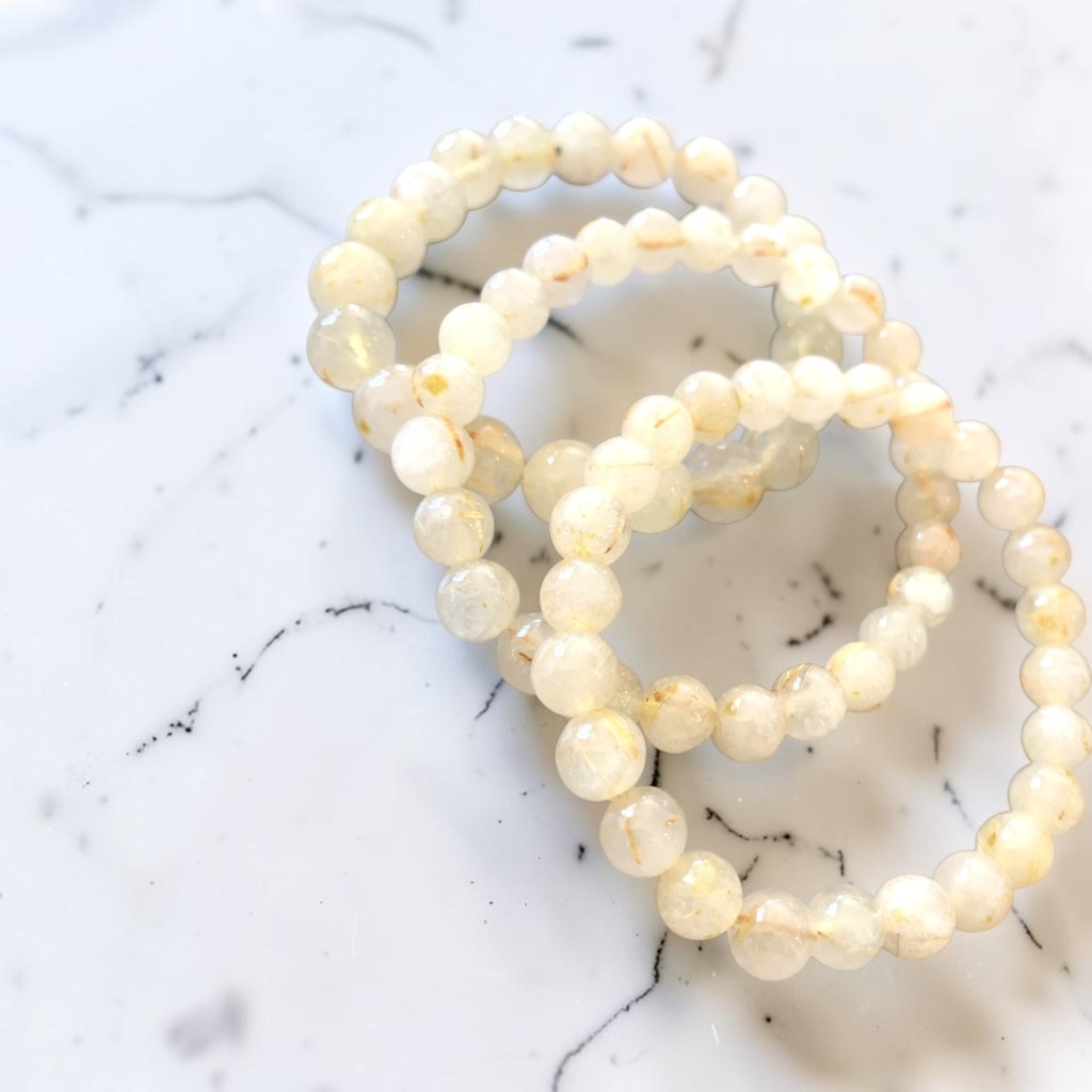 Rutilated Quartz /milky or smoky gray