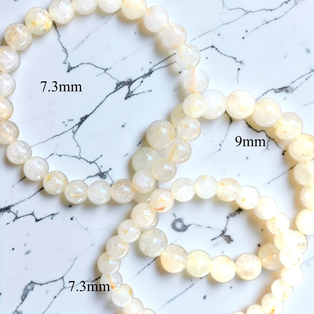 Rutilated Quartz /milky or smoky gray