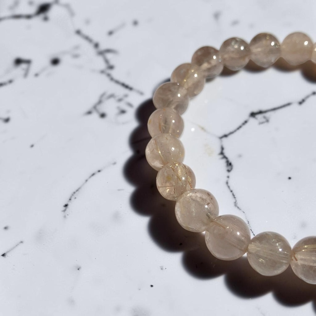 Rutilated Quartz /milky or smoky gray