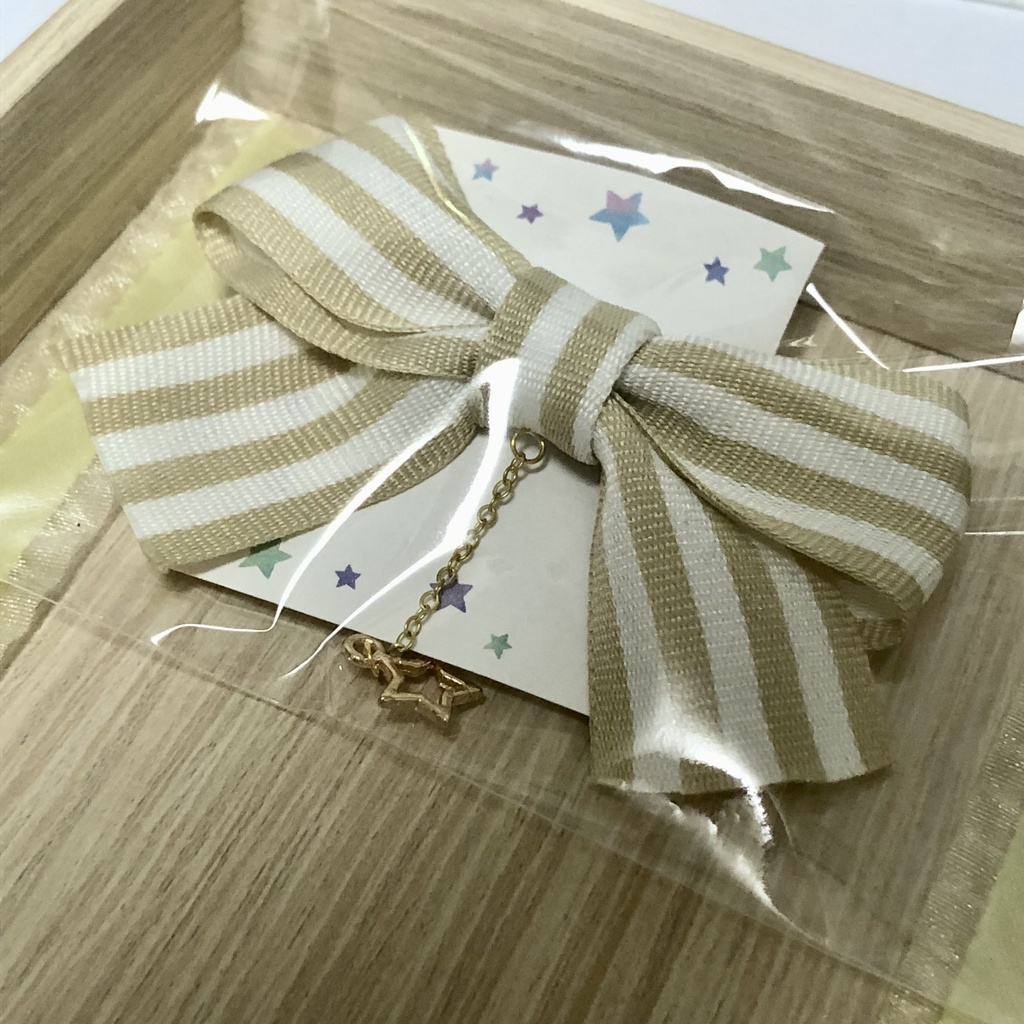 星が揺れるリボンクリップ