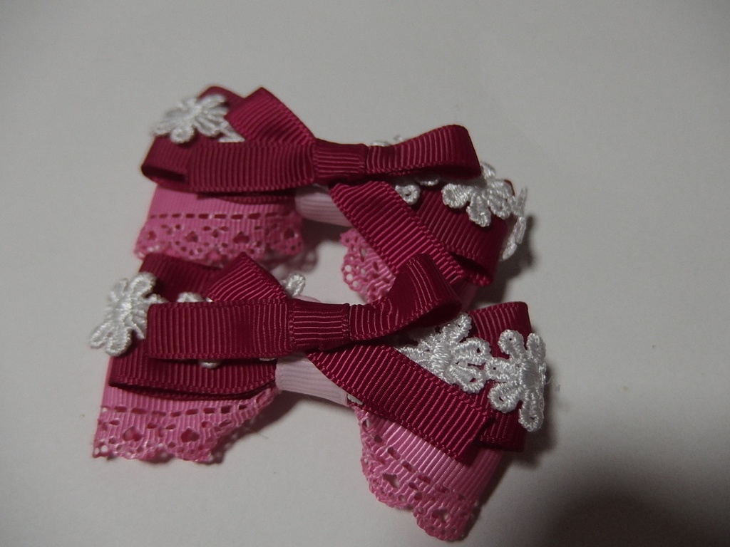 濃いピンクとピンクのリボンを合わせたヘアクリップ