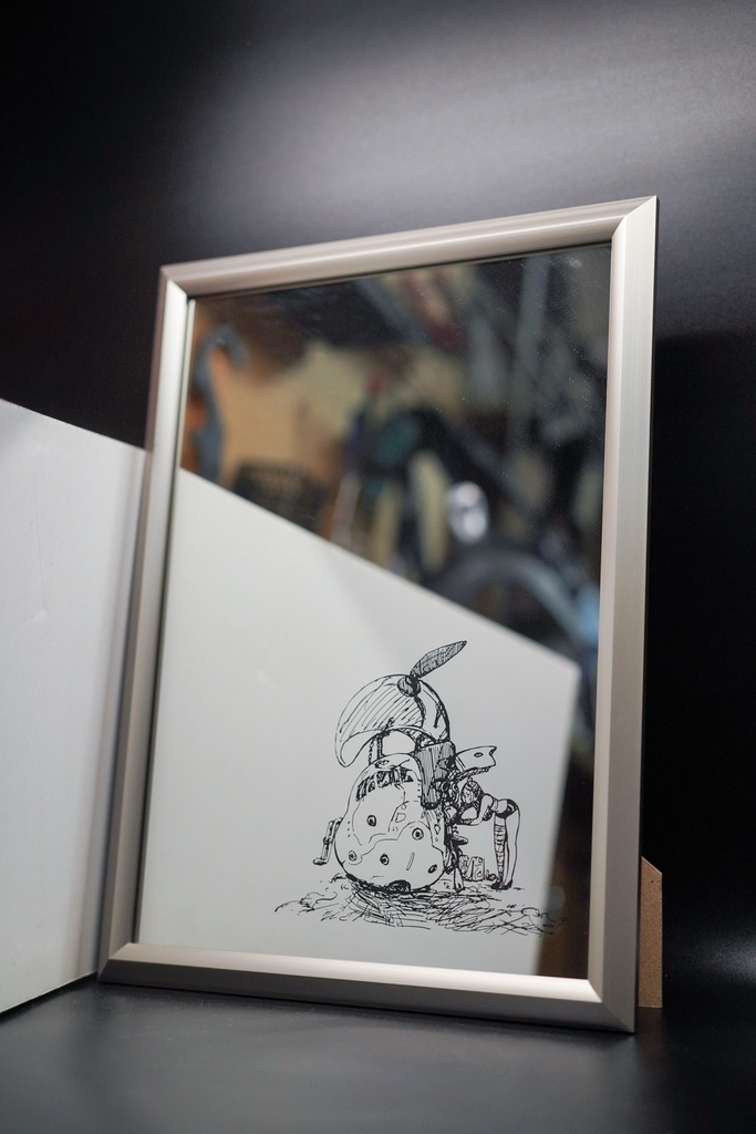 「みかんファイターを修理するみかん」特製鏡