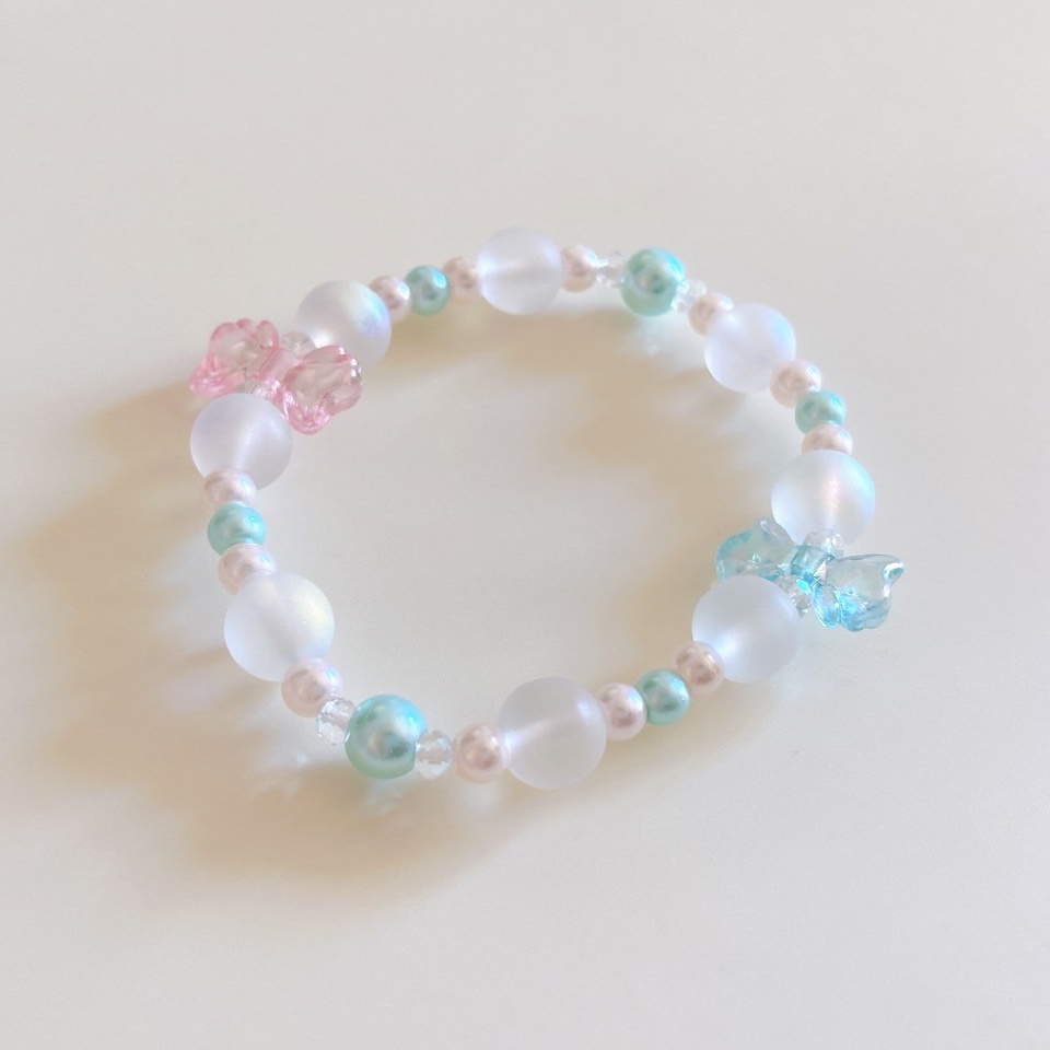 #00001ミントとピンクのダブルリボンブレスレット