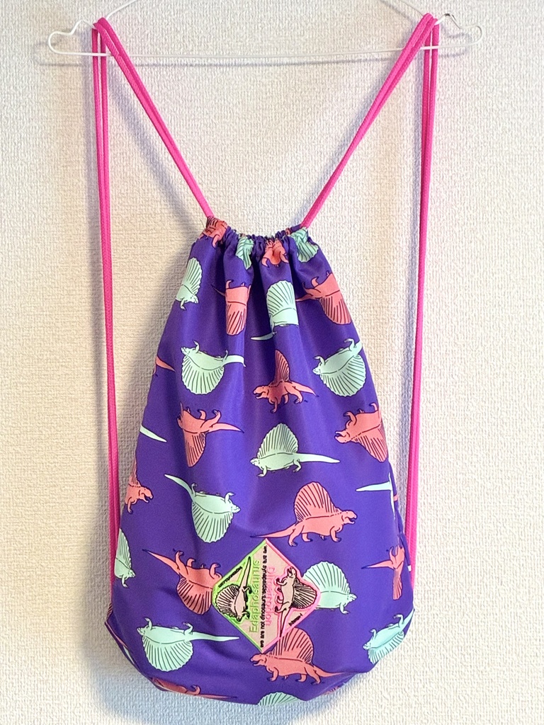 単弓類リフレクターワッペン付きナップサック(バックパック)