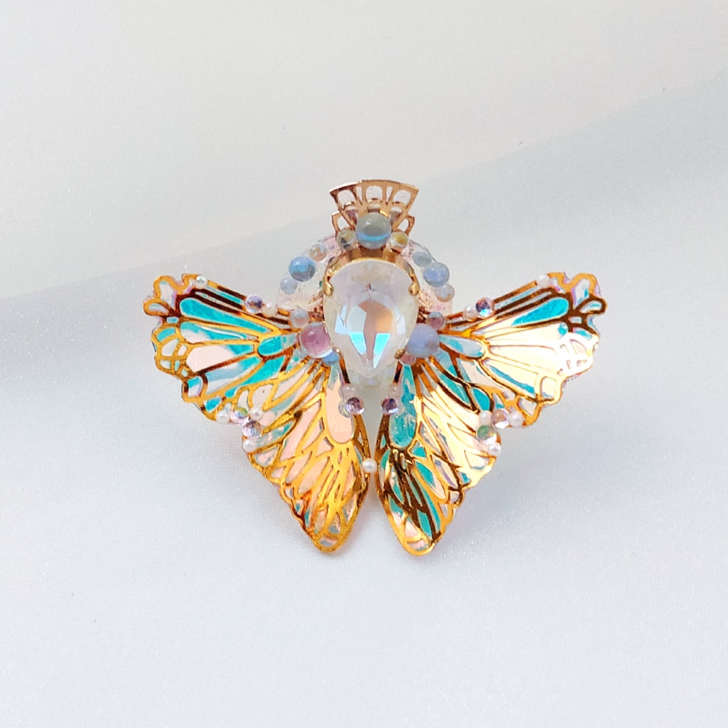 -幻想羽- 角度で色が変わる不思議なブローチ『オーロラリウム -Aurorarium-』