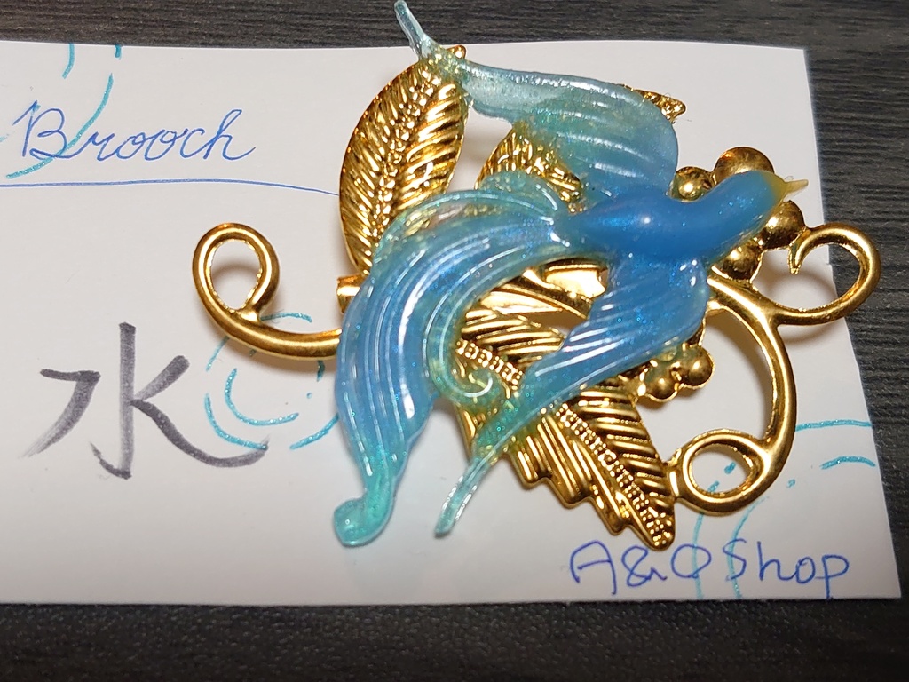 6属性のフェニックス ブローチ