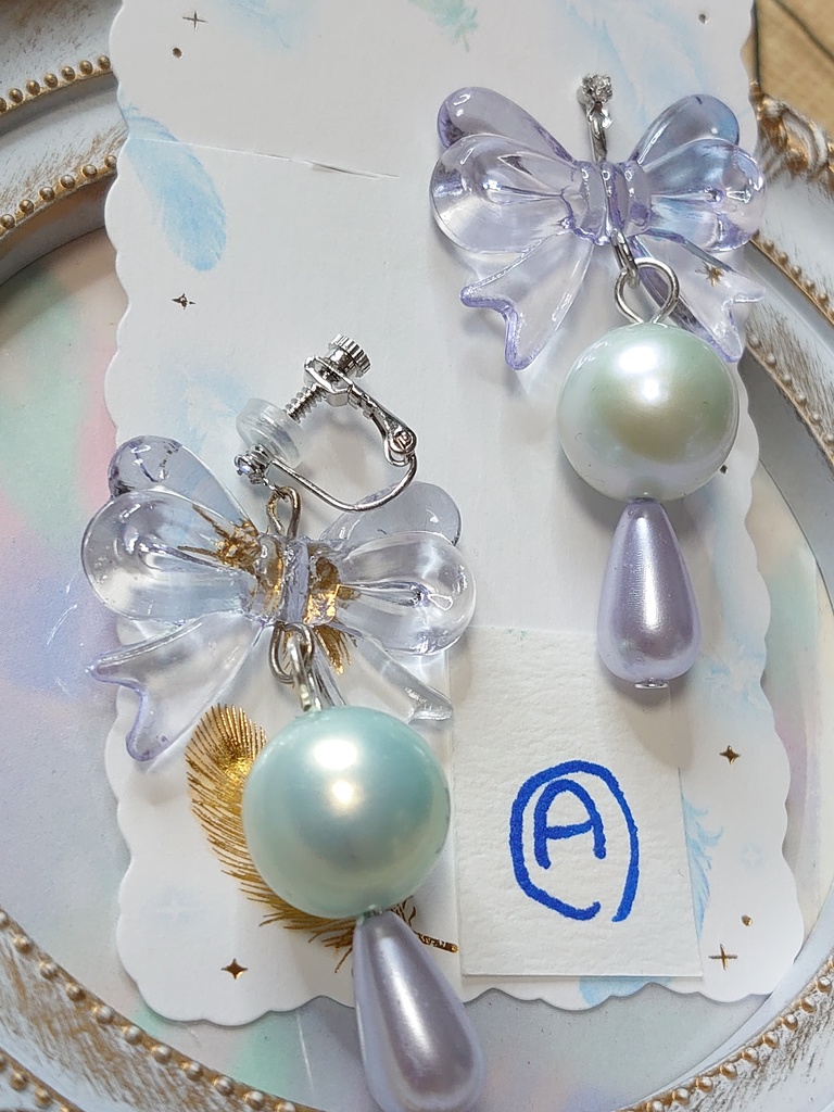 パールリボンのイヤリング・ピアス