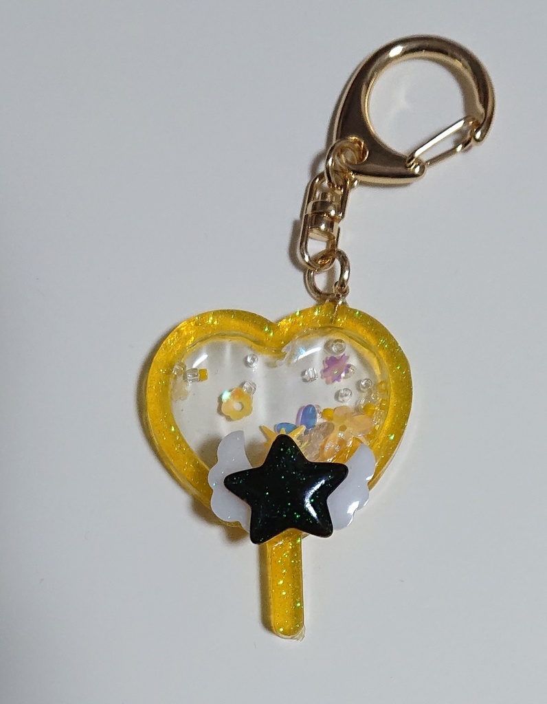 概念キーホルダー　黄色黒星