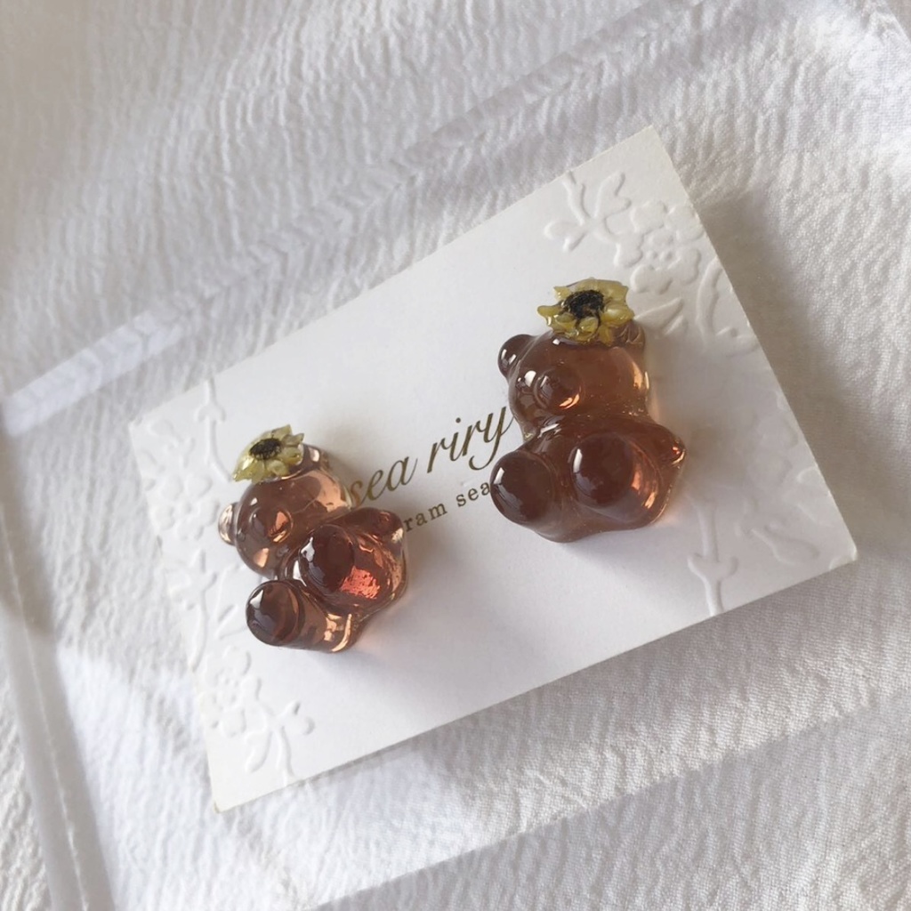 no.69 限定 sale こんがり日焼けしたひまわりくまさん 向日葵 スターフラワー くまさん teddybear レジンピアス イヤリング ハンドメイド