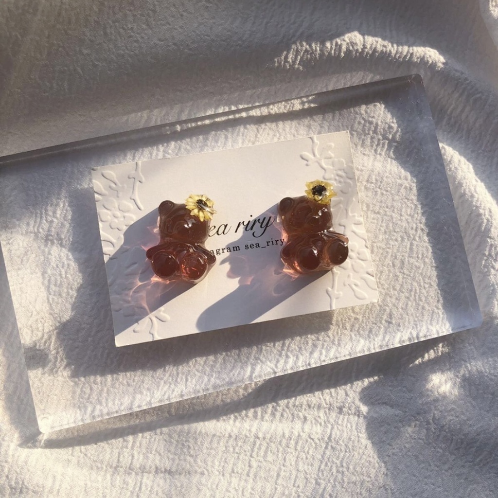 no.69 限定 sale こんがり日焼けしたひまわりくまさん 向日葵 スターフラワー くまさん teddybear レジンピアス イヤリング ハンドメイド