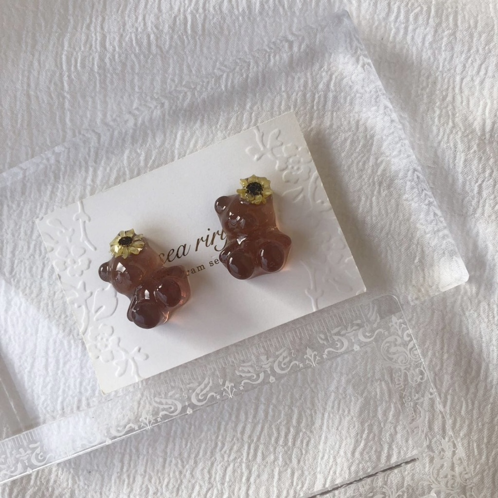 no.69 限定 sale こんがり日焼けしたひまわりくまさん 向日葵 スターフラワー くまさん teddybear レジンピアス イヤリング ハンドメイド