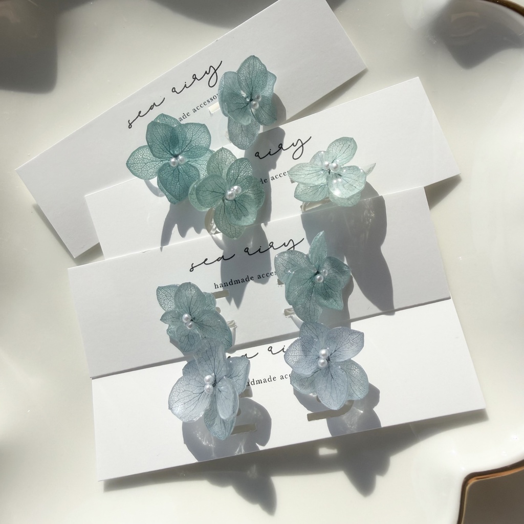 no.411 くすみグリーンのノンホールピアス 本物のお花 紫陽花 パール 樹脂ノンホールピアス イヤリング