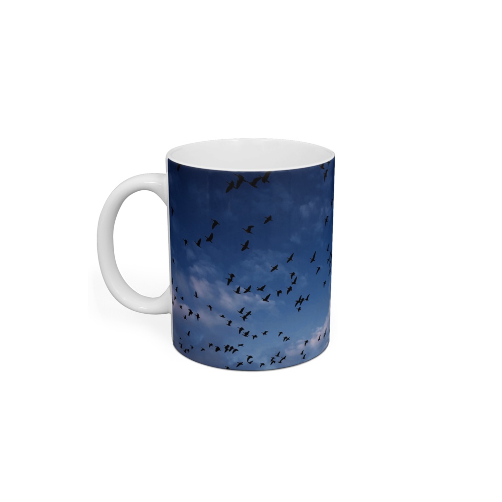 夜明けの飛び立ちマグカップ