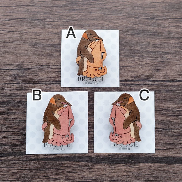 イカとキングペンギン 木製ブローチ