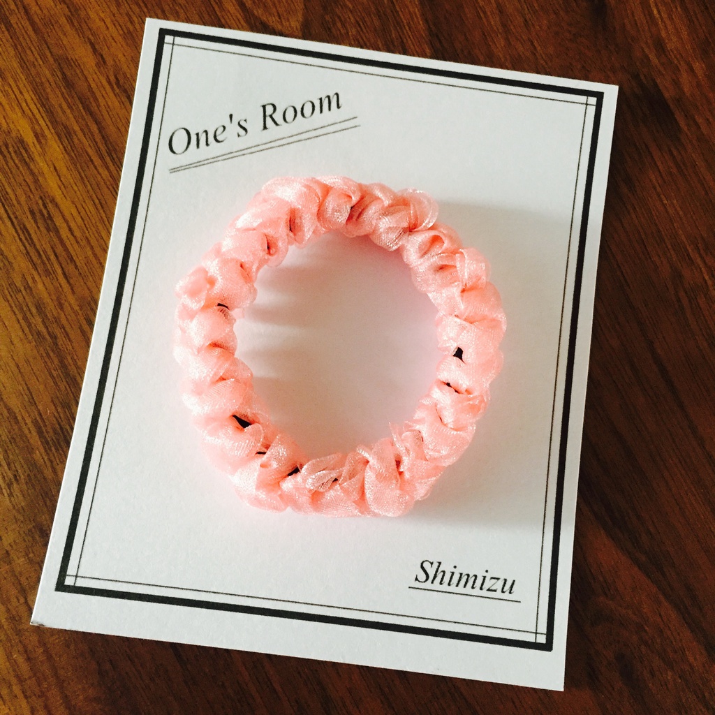 ピンクのリボンヘアゴム