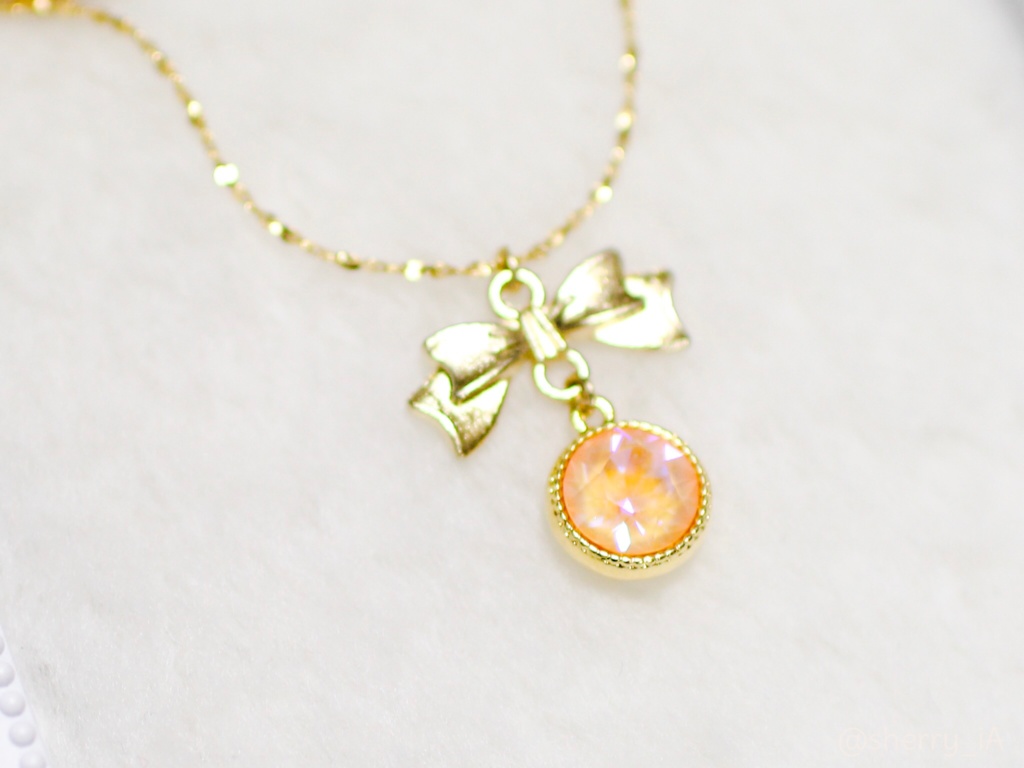 大粒スワロのリボンチャームネックレス