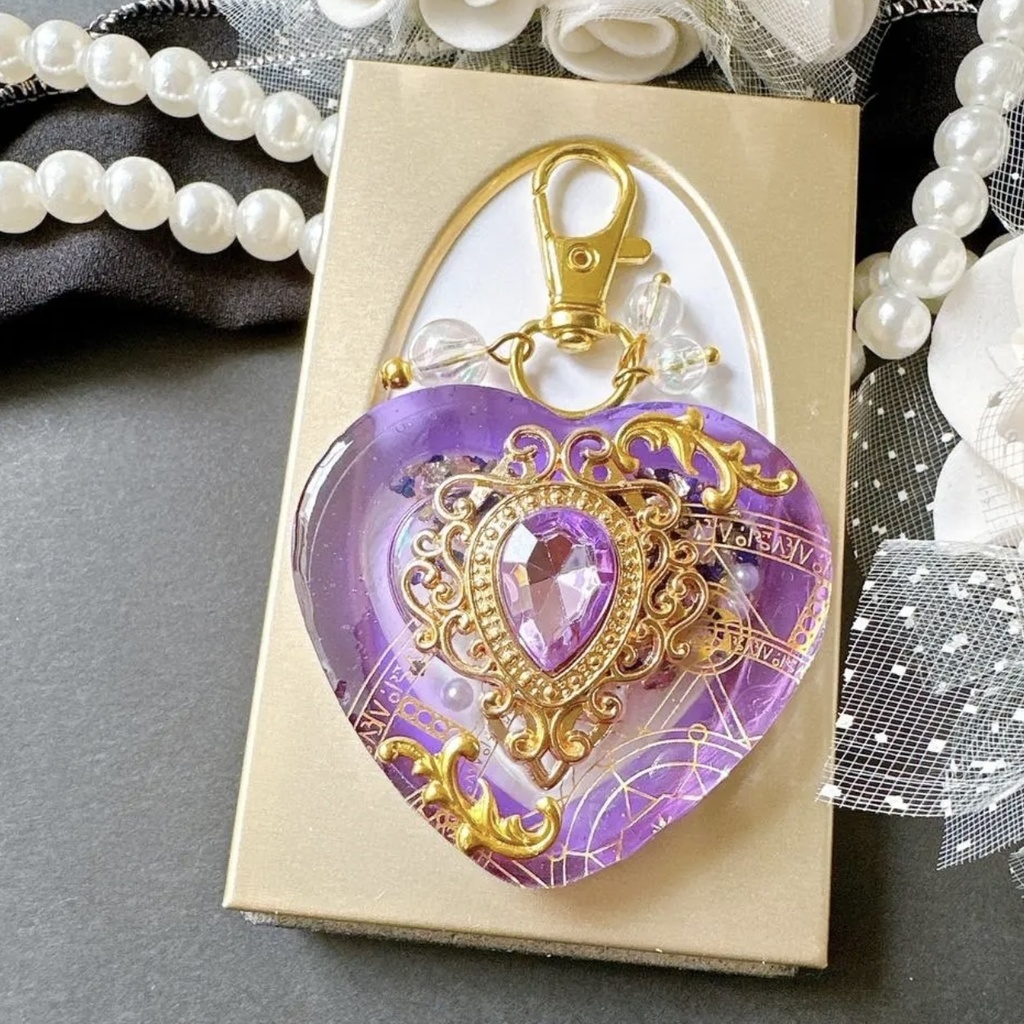 紫の女神バージョン 女神の舞踏会– Bal de Déesse – オイル入りシェイカー シャカシャカキーホルダー