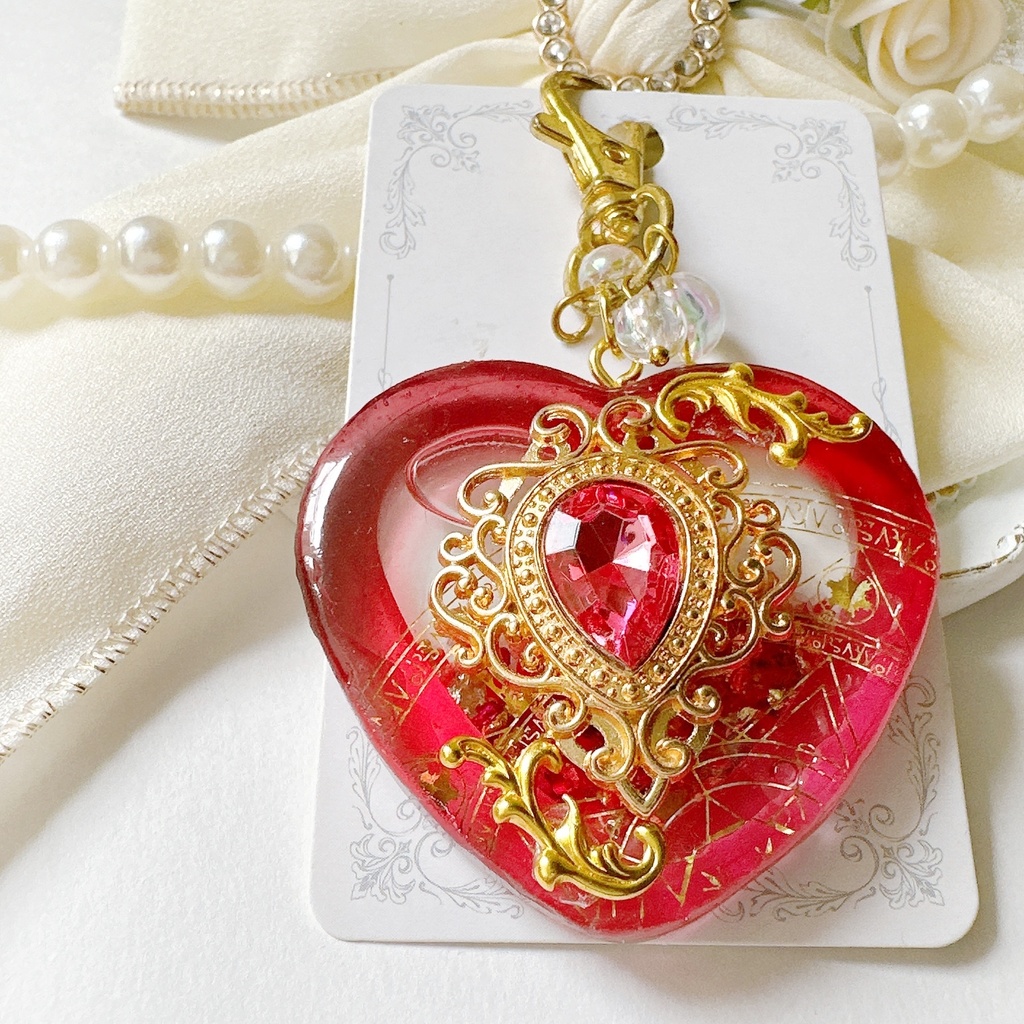 ルビーの女神バージョン 女神の舞踏会– Bal de Déesse – オイル入りシェイカー シャカシャカキーホルダー