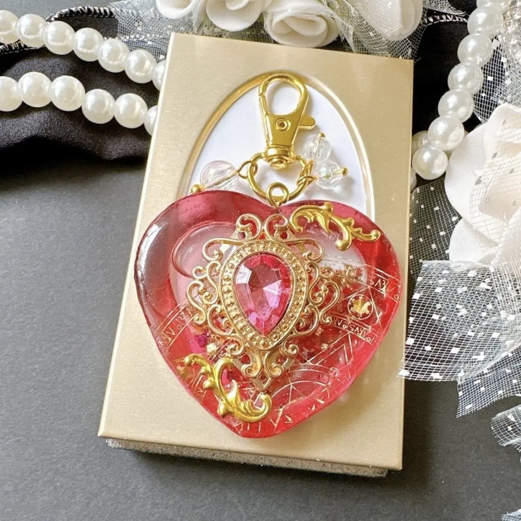 ルビーの女神バージョン 女神の舞踏会– Bal de Déesse – オイル入りシェイカー シャカシャカキーホルダー