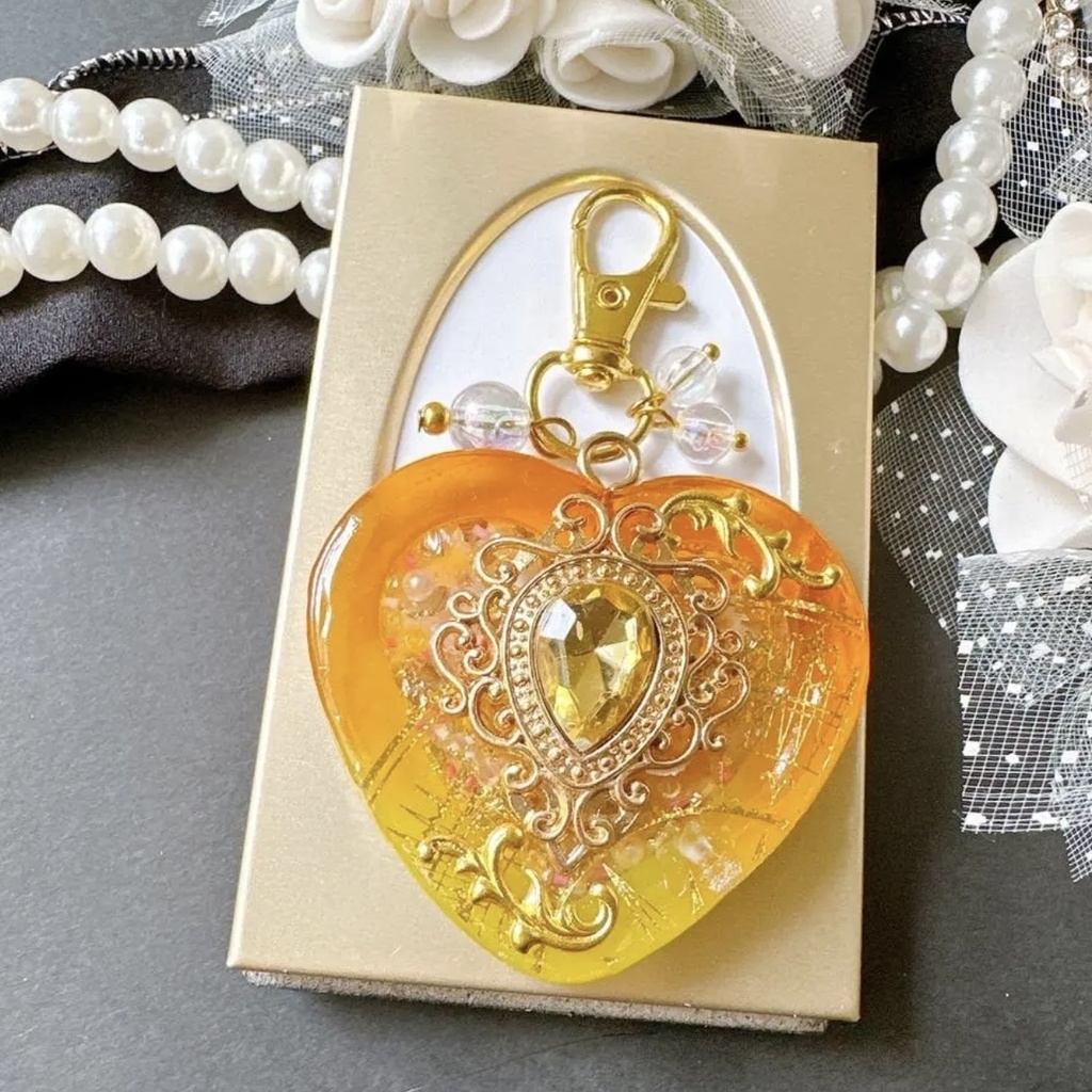 オレンジの女神バージョン 女神の舞踏会– Bal de Déesse – オイル入りシェイカー シャカシャカキーホルダー