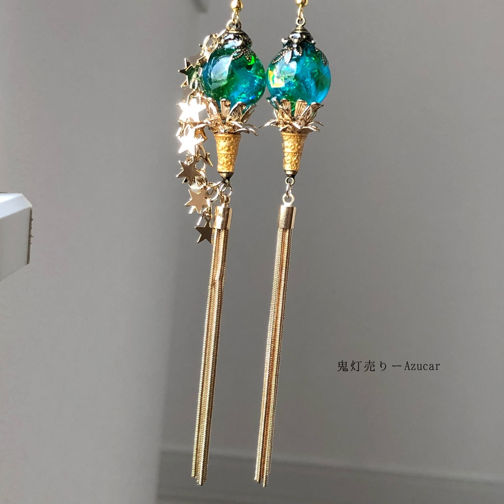 天体魔法使いの蓄光星屑ランタン アシンメトリーピアス イヤリング タッセル付き