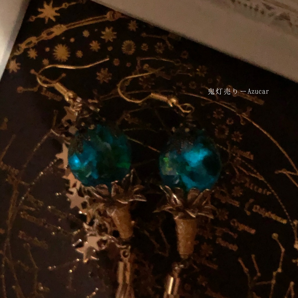 天体魔法使いの蓄光星屑ランタン アシンメトリーピアス イヤリング タッセル付き